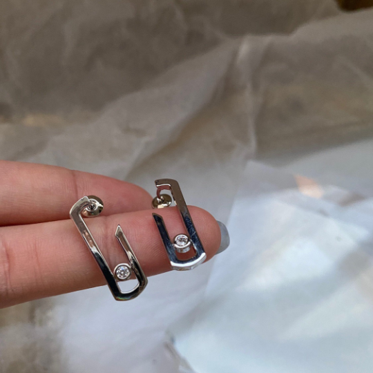 Safety pin hot sale earrings cartier